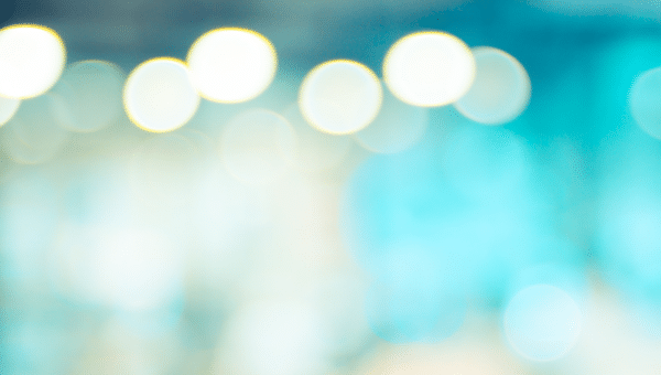 Blurred background image of lights, white and blue
