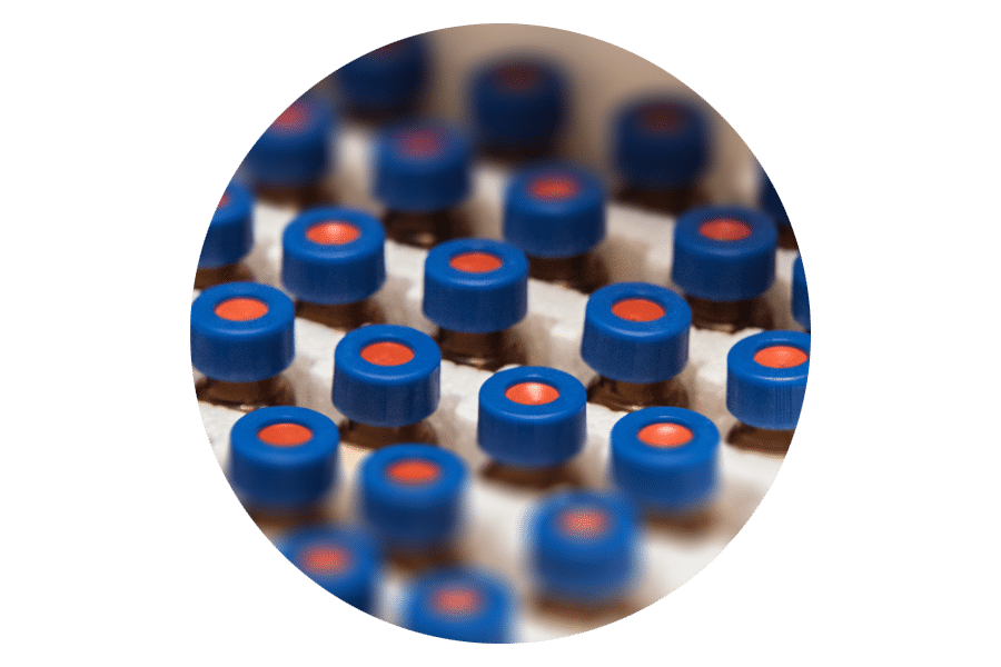 Roundel image of vials for Advancing pharmocogenomics research